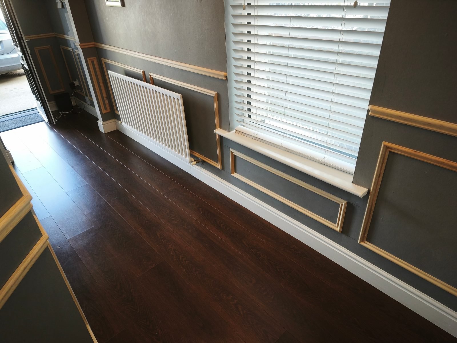 Charcoal panelling with gold bead