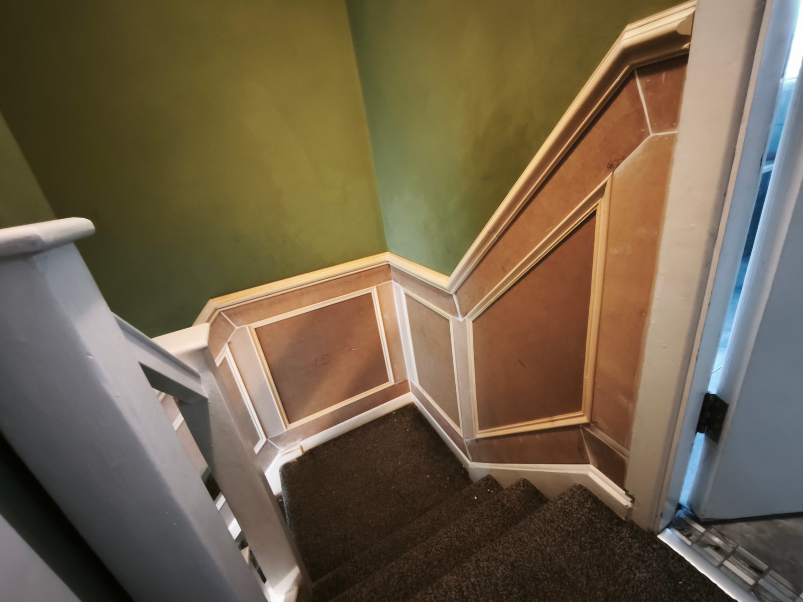 Wall covering panelling on a stairwell landing